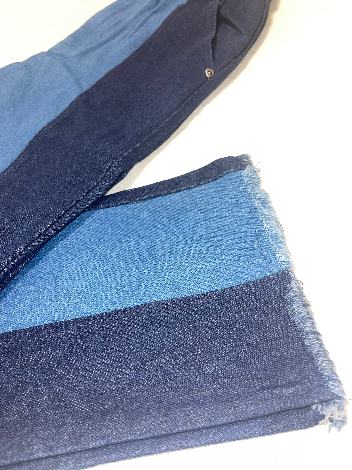 Mirage Jeans: Two-tone denim masterpiece, showcasing a blend of style and mystery for a fashion-forward statement.