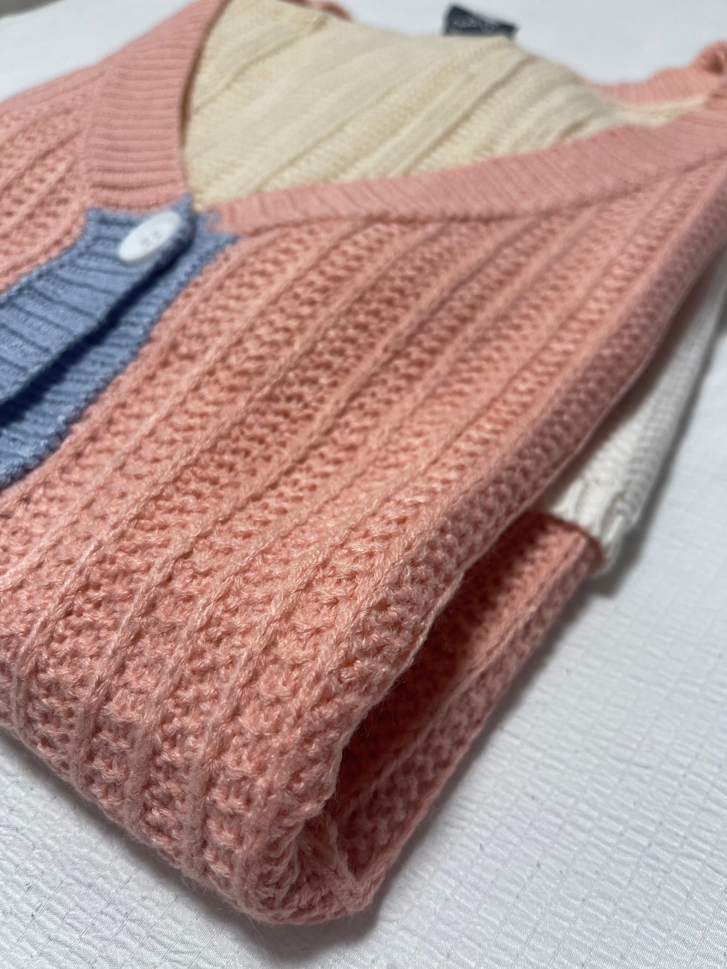 A luxurious acrylic polyester knitted color block cardigan named Park City Cardigan