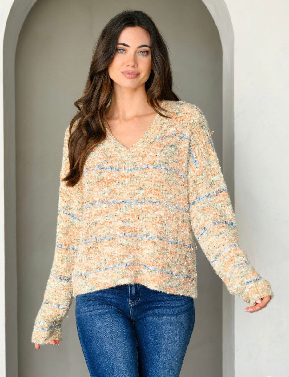 Ayla - Chunky, Colorful Chenille V-Neck Sweater showcasing vibrant threads and luxurious texture for a stylish and cozy look.